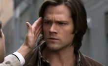 Castiel breaks down Sam's wall.