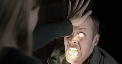 Castiel smites a demon while possessing Claire.