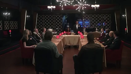 Dean and Sam in their assigned seats as "guests of honor."