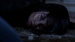 Jenna lying on the ground after Amara consumed her soul