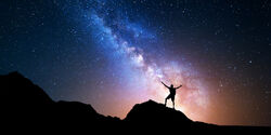 Man-standing-night-sky