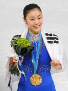 Kim Yuna at the Vancouver Olympics, holding the South Korean flag