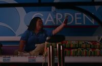 S01E09-Sandra on top of garden shelf