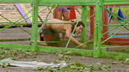 Jay attempts to crawl through one of the obstacles.