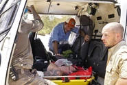 Production prepares to fly Caleb to a hospital.