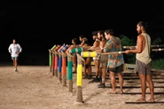 The Merged Tribe competing in the Reward/Immunity Challenge, With a 10 ft Pole.