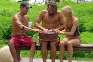 Andrea, Rob, and Grant enjoying the cake that Grant won.