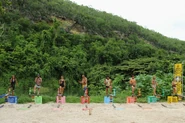The Merged Tribe competes in the Reward/Individual Immunity Challenge, A Leg Up / Bow Diddley.