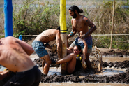 Arun and Dave prying Eve off her post in Thailand.