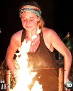 Aus07e08 phoebe fire.jpg (107 KB) Phoebe saves herself in the fire-making challenge.