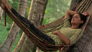 Michele laying in a hammock.