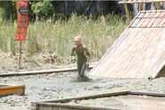 Andrea races through the mud (Caramoan).