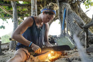 Ashley working on Levu's fire.