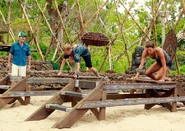 Christine and Mikayla build their bridge.