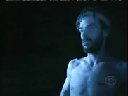 Shane watches Bruce as the latter is evacuated.