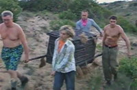 Sand arrives at their camp.