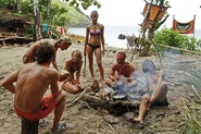 The Gota tribe around their fire. (Caramoan)