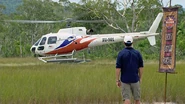 The chopper takes off with the reward winners.