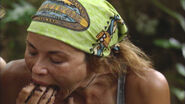 Natalie eating chocolate cake.