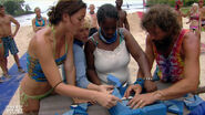 Sugar, Amanda, Cirie, and Rupert having trouble with the puzzle