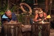 Deshawn and Heather compete in the fire-making challenge.