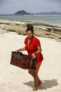 Sandra holds a crate.