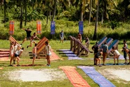 The tribes compete in the Reward/Immunity Challenge, Along the Watch Tower.
