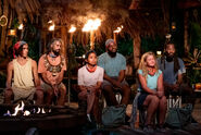 The final six at Tribal Council.