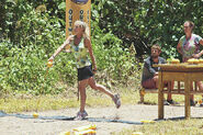 Tina competes in the Reward/Immunity Challenge, Chain Reaction.