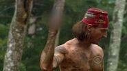 Coach flips off Jeff Probst.