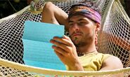 Sam reading his letter from home.