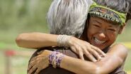 Brenda hugs her father upon seeing him.