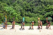 The Merged Tribe competes in the Reward/Individual Immunity Challenge, House of Cards.