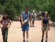 Mitchell walking at his camp.