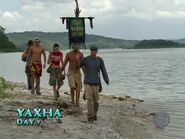 Brian leading Yaxhá back to camp after the tribe switch.