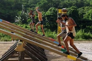 The Merged Tribe competes in the Individual Immunity Challenge, Pot Head / Wall to Wall.