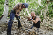 Caleb and Tony work at Mana camp.