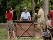 Danni and Jamie receive apples.