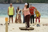 Taku competing in the opening Reward Challenge, Marooning.