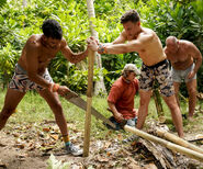 Ronnie sawing bamboo.