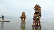 Both tribes competing in the final stage of the challenge.