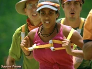 Erica pulling Ravu's chariot in Fiji.