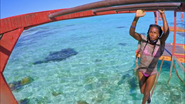Michaela finishes the monkey bars for Mana.