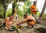 Taku enjoying their fish reward.