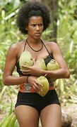 Erica gathering coconuts.