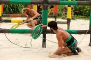 The Merged Tribe competing in the Reward/Immunity Challenge, Strung Out.