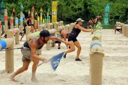 The Merged Tribe competes in the Reward/Individual Immunity Challenge, Pole Dancing.