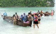 The tribes rowing to their beaches.