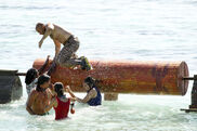 Tony competes in the Reward/Immunity Challenge, Blue Lagoon Bustle.