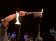 Colbytorchsnuffed.png (1.28 MB) Colby's torch being snuffed after Tina is revealed to be the winner.